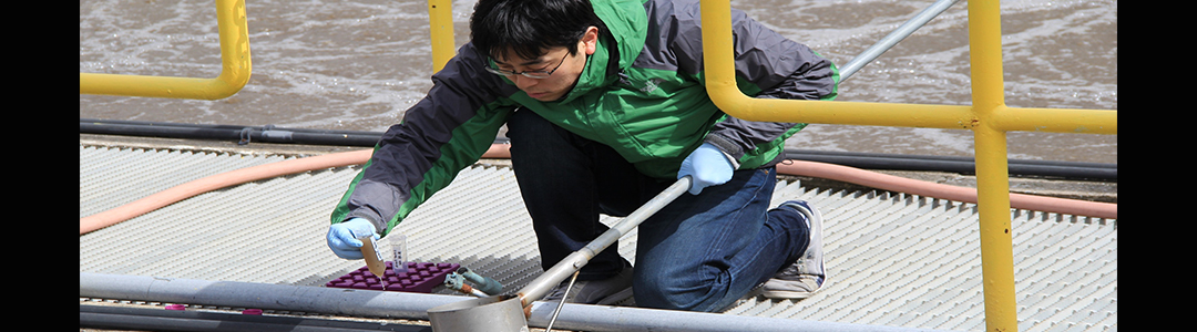 Student working at wastewater treatment plant