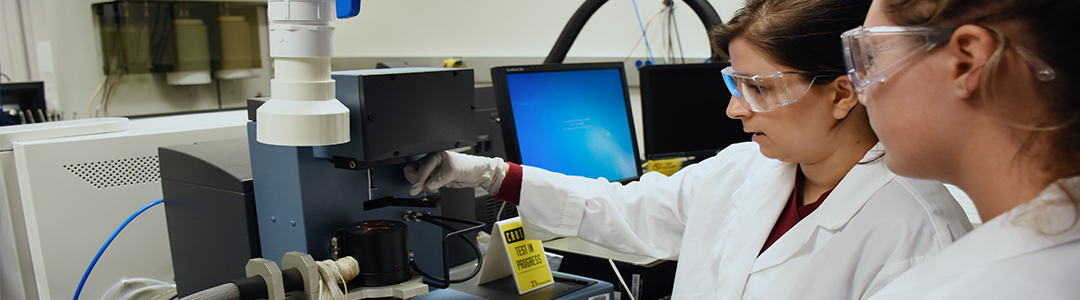 Students testing material in a lab