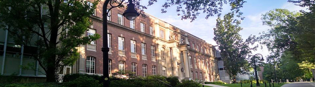 Photo of the front of Sackett building.