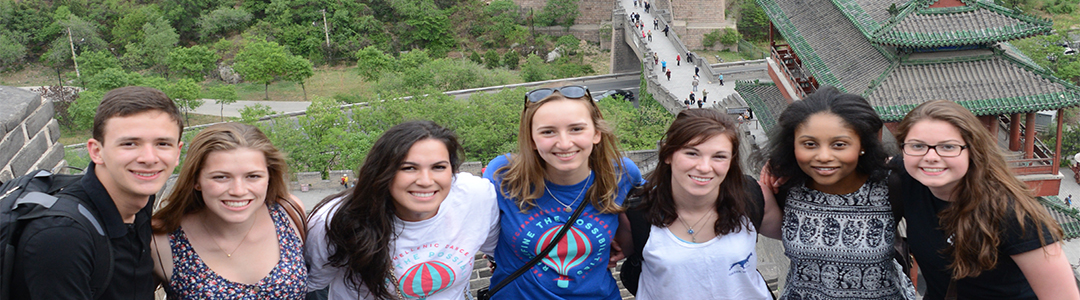 Students standing at the Great Wall in China