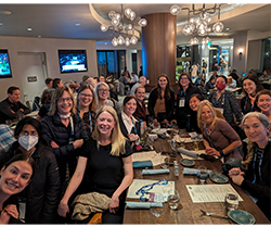 people gathered at a dining table