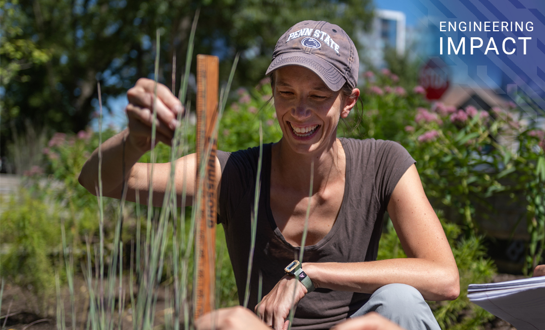 teacher survey the leaves of plants in a rain garden