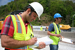 Researchers collecting data at one of the commonwealth's bridges.